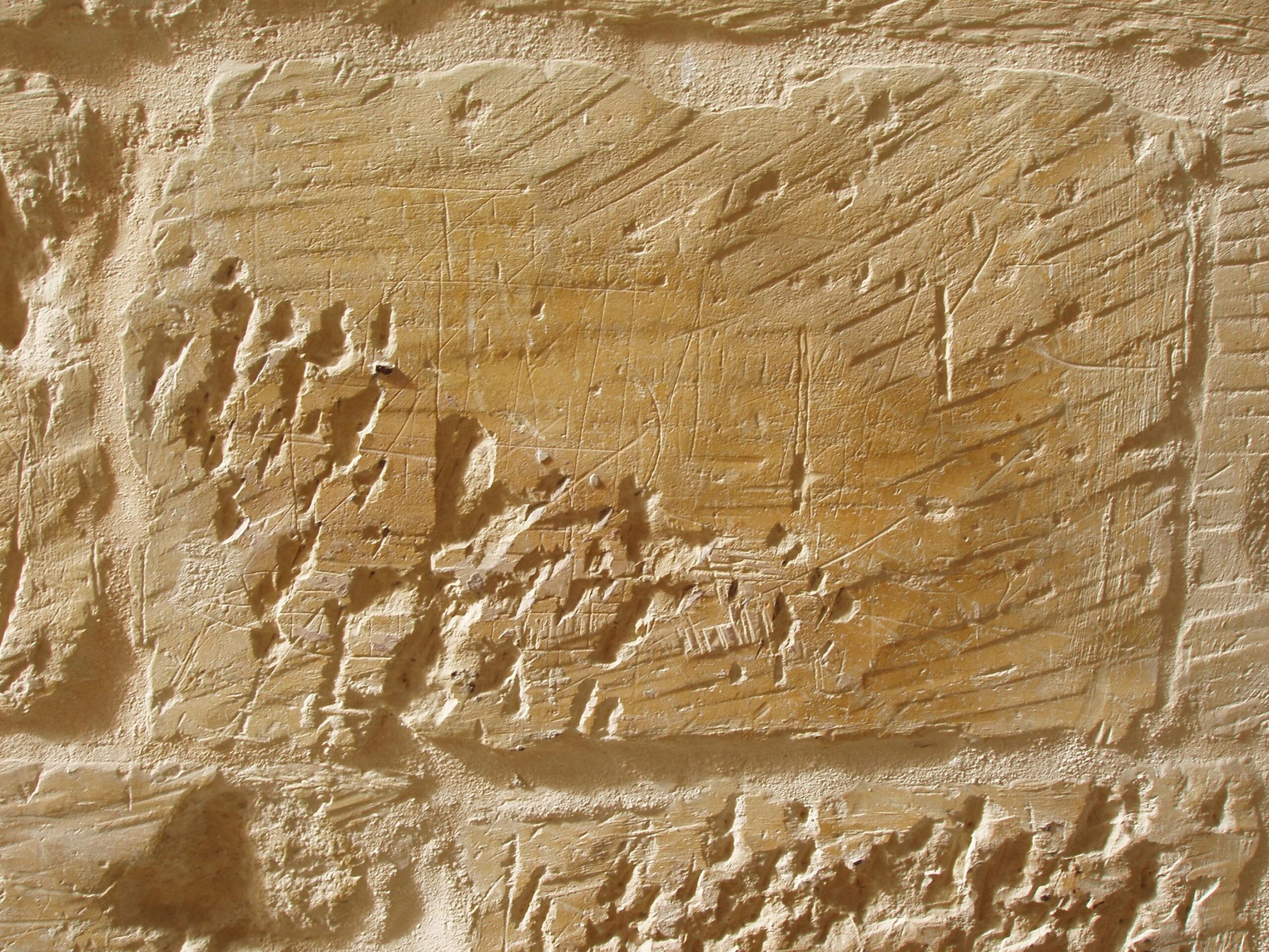 A defaced ship graffito, identified only by the ship’s hull.
