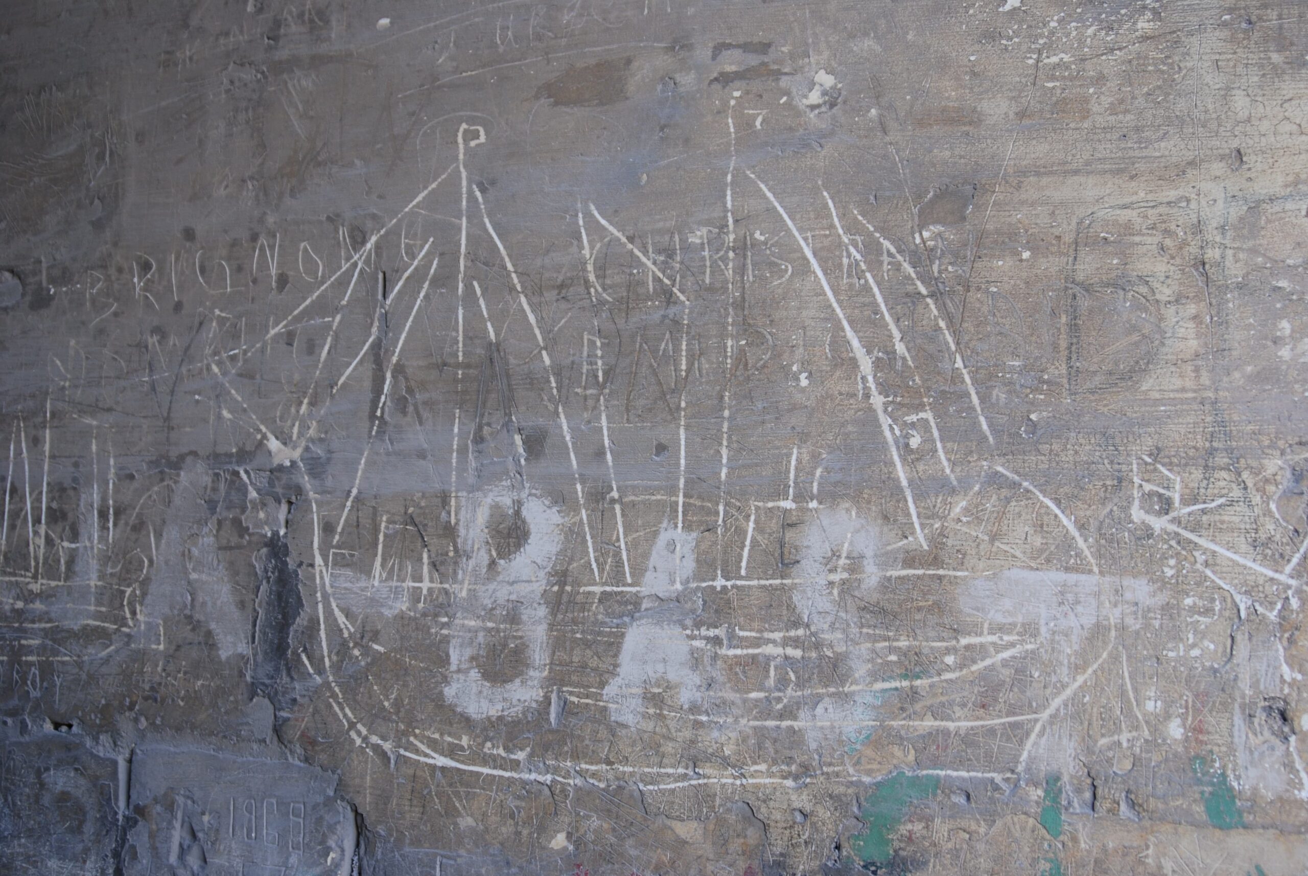 Adjacent to the previous graffito is a similar steam and sail vessel, etched in the same manner.